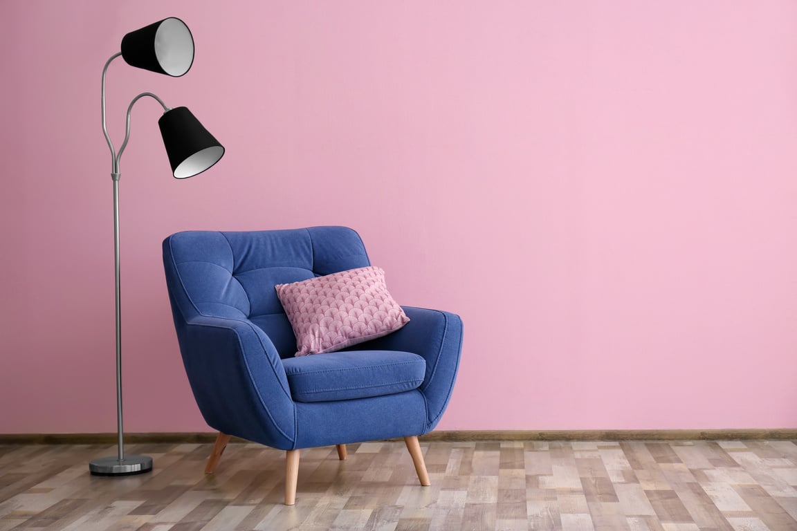 Soft Armchair and Floor Lamp near Pink Wall